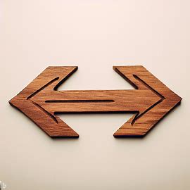 Frecce direzionali in legno